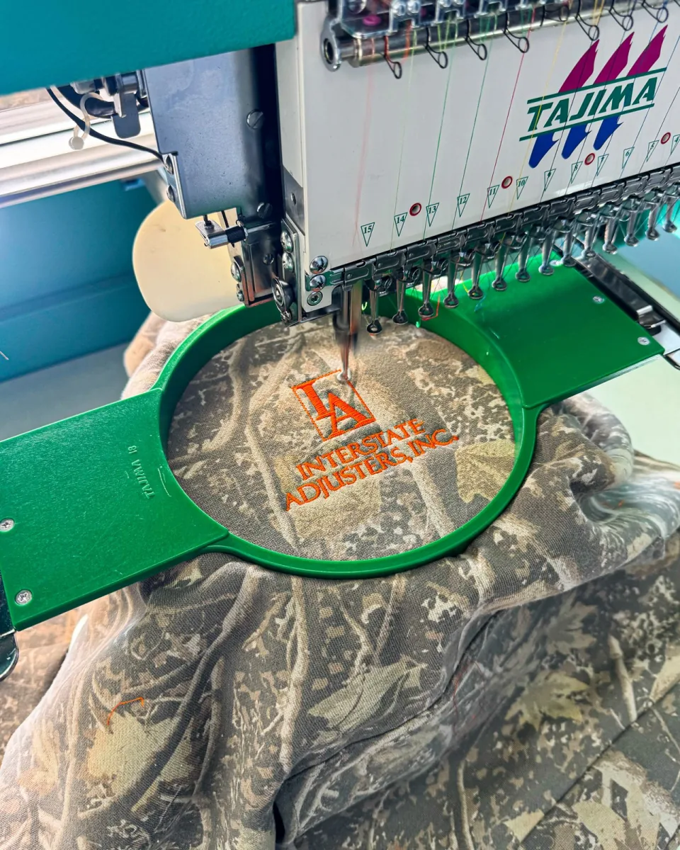 Garment embroidery in progress in the Simat shop
